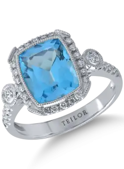 Inel din aur alb de 18K cu topaz albastru de 4ct si diamante de 0.39ct
