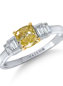 Inel din aur alb-galben cu un diamant galben de 1ct si diamante incolore de 0.3ct